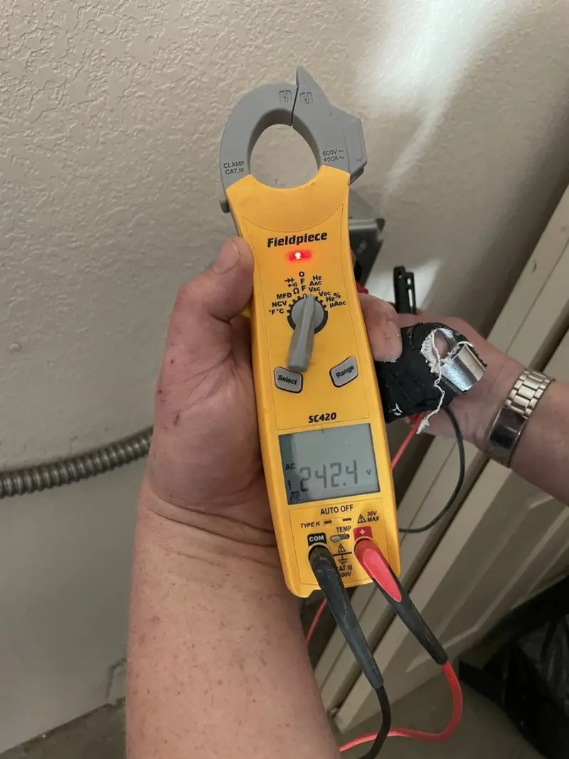 Voltage testing with clamp meter during Circuit Breaker Repair in New Martinsville